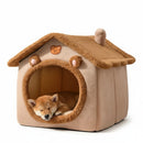 DreammyDoggie brown plush foldable dog bed house with a sleeping puppy inside, featuring a cozy cabin design.