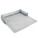 DreammyDoggie gray quilted dog bed couch with plush bolster support and a flat, comfortable sleeping surface.