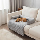 DreammyDoggie gray quilted dog bed couch protector with raised bolsters, featuring a sleeping beagle on a living room sofa.