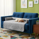 DreammyDoggie gray quilted pet sofa cover on a blue couch with a sleeping dog in a modern living room