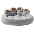 DreammyDoggie plush grey calming dog bed with a cute paw print design and soft raised edges for anxiety relief