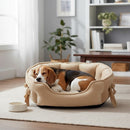 DreammyDoggie khaki plush anti-anxiety princess dog bed with bow detail and beagle sleeping inside on a rug