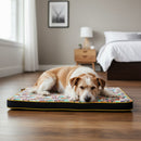 DreammyDoggie large dog mattress with a vibrant British-themed pattern, featuring thick cushioning on a wooden floor.
