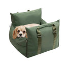 DreammyDoggie olive green waterproof anti-anxiety dog car seat with a puppy resting inside on a white background