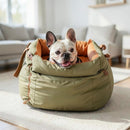DreammyDoggie luxury faux leather booster dog car seat in olive green with a French Bulldog resting inside