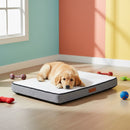 DreammyDoggie orthopedic memory foam dog bed with a grey waterproof cover and a golden retriever puppy resting on it.