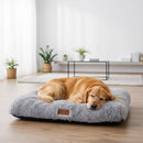 DreammyDoggie plush grey dog bed with a golden retriever sleeping comfortably on a wooden floor in a bright room.