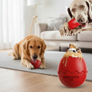 DreammyDoggie red egg-shaped dog anxiety chew toy filled with treats for mental stimulation and slow feeding